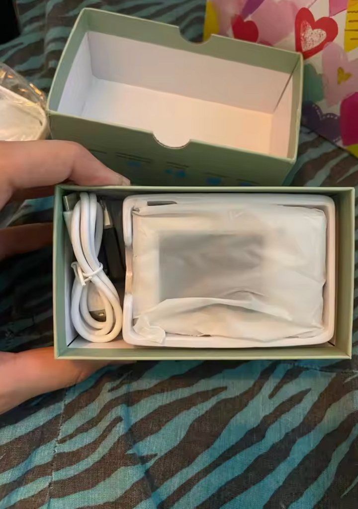 Sunfilms camera accessories arranged inside the gift box